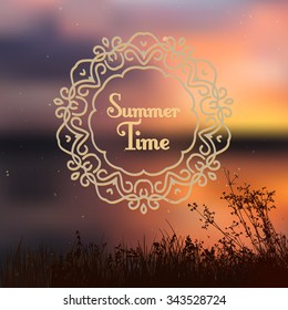 blurred summer sunset background with grass silhouettes in front and ornate vignette