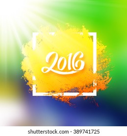 Blurred vector background with Brazil flag colors and 2016 text lettering in square frame. Abstract smooth gradient in green, yellow, blue tones for summer banner with bright sun rays