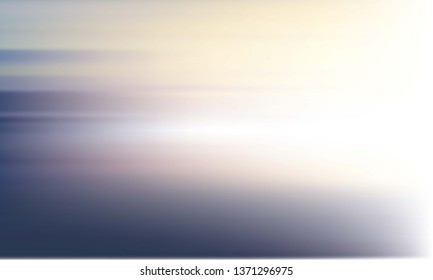 Blurred yellow-blue background. Light sky and sea landscape.