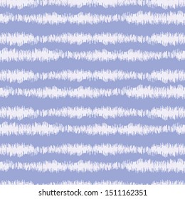 Blurry indigo blue shibori striped tie dye background. Seamless pattern with irregular broken stripe bleached resist. Dip dyed bright batik textile. Variegated textured trendy boho fashion swatch