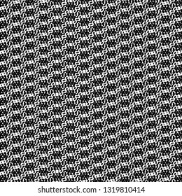 Blurry polka dots pattern. Knit fabric texture. Graphics in black and white. Vector illustration.