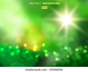 Blurry summer green field and sun with bokeh effect. Vector EPS 10 illustration.