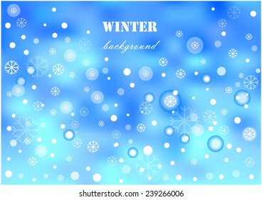 blurry winter background with snowflakes