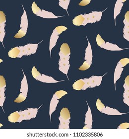 Blush pink feathers with gold endings seamless pattern. Tender pastel colors bird feathers abstract fashion dark blue background.