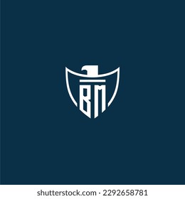 BM initial monogram logo for shield with eagle image vector design