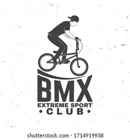 Bmx extreme sport club badge. Vector illustration. Concept for shirt, logo, print, stamp, tee with man ride on a sport bicycle. Vintage typography design with bmx cyclist silhouette.