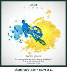 BMX rider with abstract background