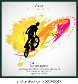 BMX rider with abstract background