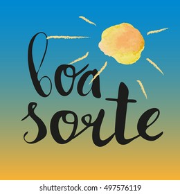 "Boa sorte" - "good luck" in Portuguese, hand lettering with watercolor sun.