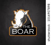 Boar on a dark background. Vector boar with room for text.