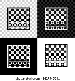 Board game of checkers icon isolated on black, white and transparent background. Ancient Intellectual board game. Chess board. White and black chips. Vector Illustration