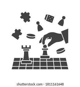 Board game of chess black glyph icon. Hand holding chess figure. Home leisure. Vector isolated illustration.