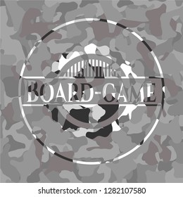 Board-game on grey camouflage pattern