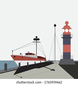 Boat parked in dock near lighthouse