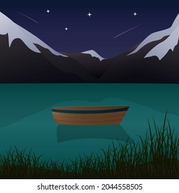 The boat sails on a mountain lake against the backdrop of mountains