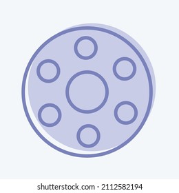 Bobbin Icon in trendy two tone style isolated on soft blue background