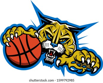 bobcat basketball team mascot holding ball in claw for school, college or league
