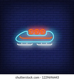 Bobsleigh neon sign. Glowing bob with sport team on dark blue brick background. Can be used for sport, winter games, Olympic