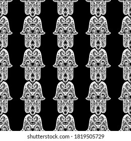 Bohemian seamless ornament with hamsa or hand of Fatima.Ornate vector wallpaper, decorative vector art.