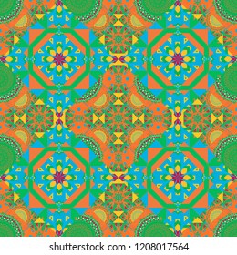 Bohemian style background in orange, blue and green colors. Vector decorative floral embroidery seamless pattern, ornament for textile, kerchief, pillow or handbag decor.