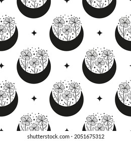 Boho black and white seamless pattern with crescent moon, wildflowers and stars. Bohemian modern background. Celestial wrapping paper.