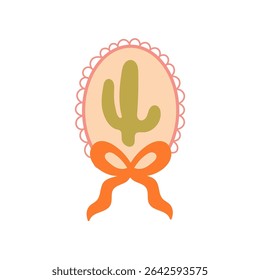 Boho cactus in pink scalloped frame with orange ribbon decoration  