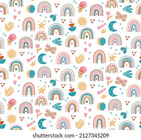 Boho cute colorful seamless vector pattern with rainbows magic symbols and graphic elements
