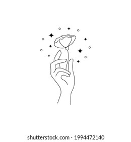 Boho hand drawn magic logo. Minimal mystic bohemian line hand hold fliwer esoteric tattoo sign, vector illustration design