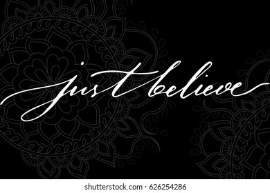 Boho handlettering quote phrase mandala just believe text black background hand drawn grey mandala, vector. Can be used as wall decoration or print on mug. Mandala is not cropped, hidden under mask.