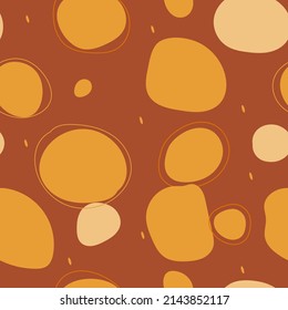 Boho irregular shapes seamless pattern background. Big abstract dots and circles pattern for fabric print, cover, textile, wrapping. Vector seamless spots on warm brown background