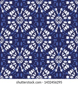 Boho Monochrome Indigo Blue Tie-Dye Shibori Mirrored Sunburst Mandala Background Vector Seamless Pattern. Perfect for Spring-Summer Textiles, Stationery