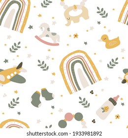 Boho newborn baby seamless pattern with baby care items. Vector repeating texture. Modern hand drawn Prints with rainbow in Boho style.