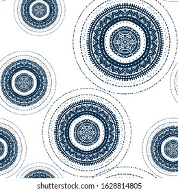 Boho pattern of hand drawn detailed circles. Seamless template in classic blue colour design