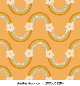 Boho rainbow with flowers vector seamless pattern. Hippie child abstract arc and daisies background. Retro summer colours nature surface design for nursery and baby fashion.