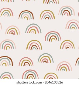 Boho rainbow pattern. Cute hand-drawn, abstract rainbow doodle. Seamless vector baby pattern in muted colors.