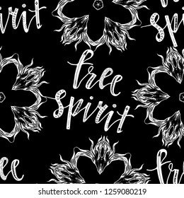 Boho seamless pattern with abstract flowers and lettering element: free spirit. Hand painted phrase.