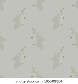 boho seamless pattern with deer head with antlers, feathers and flowers, green leaves and wild berry sprig. Wild nature ornament on grey background. Ethnic vector print for paper and fabric