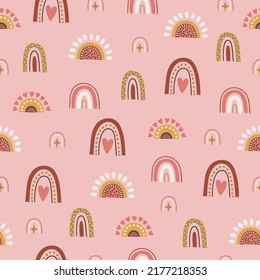Boho seamless pattern with different rainbows on pink background. Perfect for greetings card, wallpaper, wrapping paper, fabric. Vector illustration