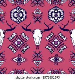 Boho seamless pattern with a wild buffalo skull in henna tattoo art style. Indian ornaments.