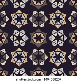Boho snowflake from patterned triangles. Seamless pattern. Merry Christmas! Vector illustration. Can be used for wallpaper, textile, invitation card, wrapping, web page background.