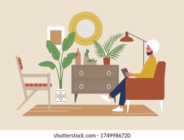 Interior acogedor estilo Boho lleno de detalles, un joven personaje masculino indio leyendo un libro sentado en una silla, estilo de vida milenario