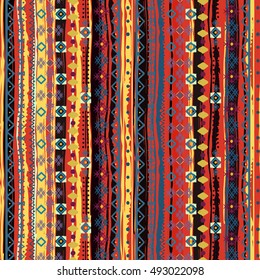 Boho style. Ethnic seamless pattern. Tribal art print. Old abstract background texture. Distressed. Lines, stripes, flowers, geometric shapes. Decoration. Vector design