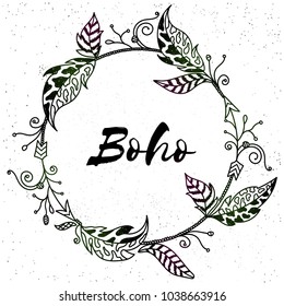 Boho style frames with ethnic hand drawn elements like feathers, flowers and arrows.