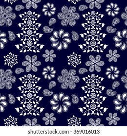 Boho style seamless pattern with floral motifs. Ethnic textile collection. White on dark blue. Backgrounds & textures shop.