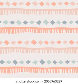 Boho style Seamless pattern with hand drawn stripes, rhombuses in doodle style in a natural color palette. Pastel naive nursery print design on a light background. Trendy contemporary kids backdrop.