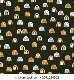 Boho style seamless pattern of hand drawn white and yellow rough rainbows on black background in vector. Perfect  for fabric, textile, scrapbook paper, wallpaper, surface design, wrapping paper.