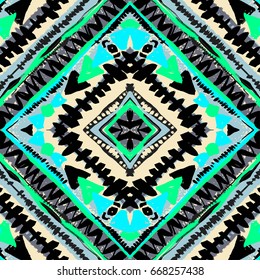 Boho textile seamless pattern. Hand drawn trendy design in tribal style with unique scrapes, watercolor blotted background . Ethnic inspired ink painted geometric print