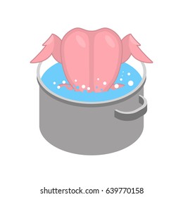 Boil chicken in saucepan. Bird and saucepan on white background
