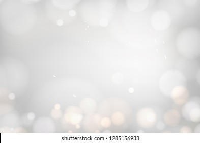 Bokeh of dust on white background. Abstract blur light effect. Falling confetti for carnival celebration. Glitter, light sparkle and shimmer confetti over gray backdrop. Vector illustration.