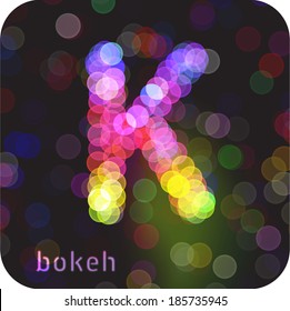 Bokeh effect by the capital letter "K". Vector Eps 10.